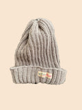 Gebreide 100% merinowollen muts - taupe