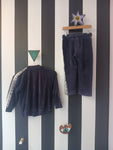donkerblauw piano pak (mt 116-122)